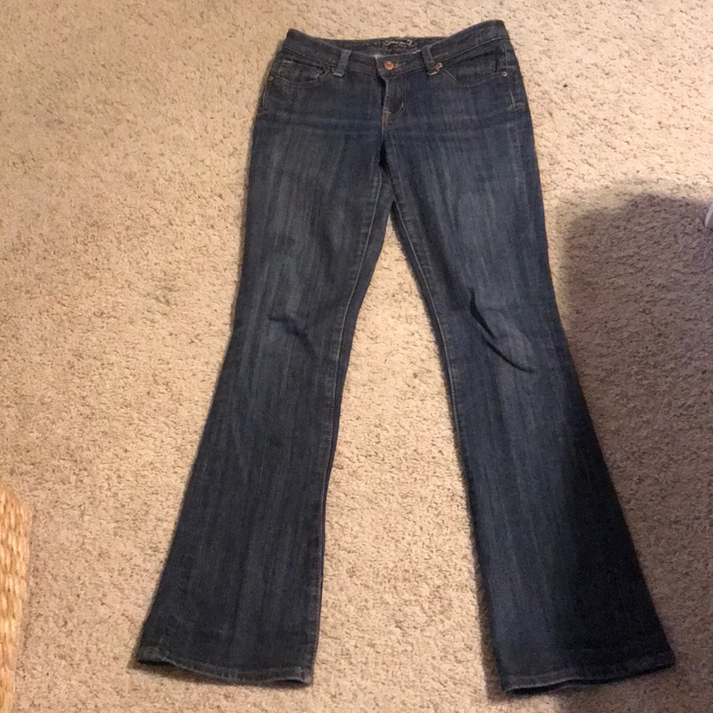 Dark flare jeans that sit at the hip